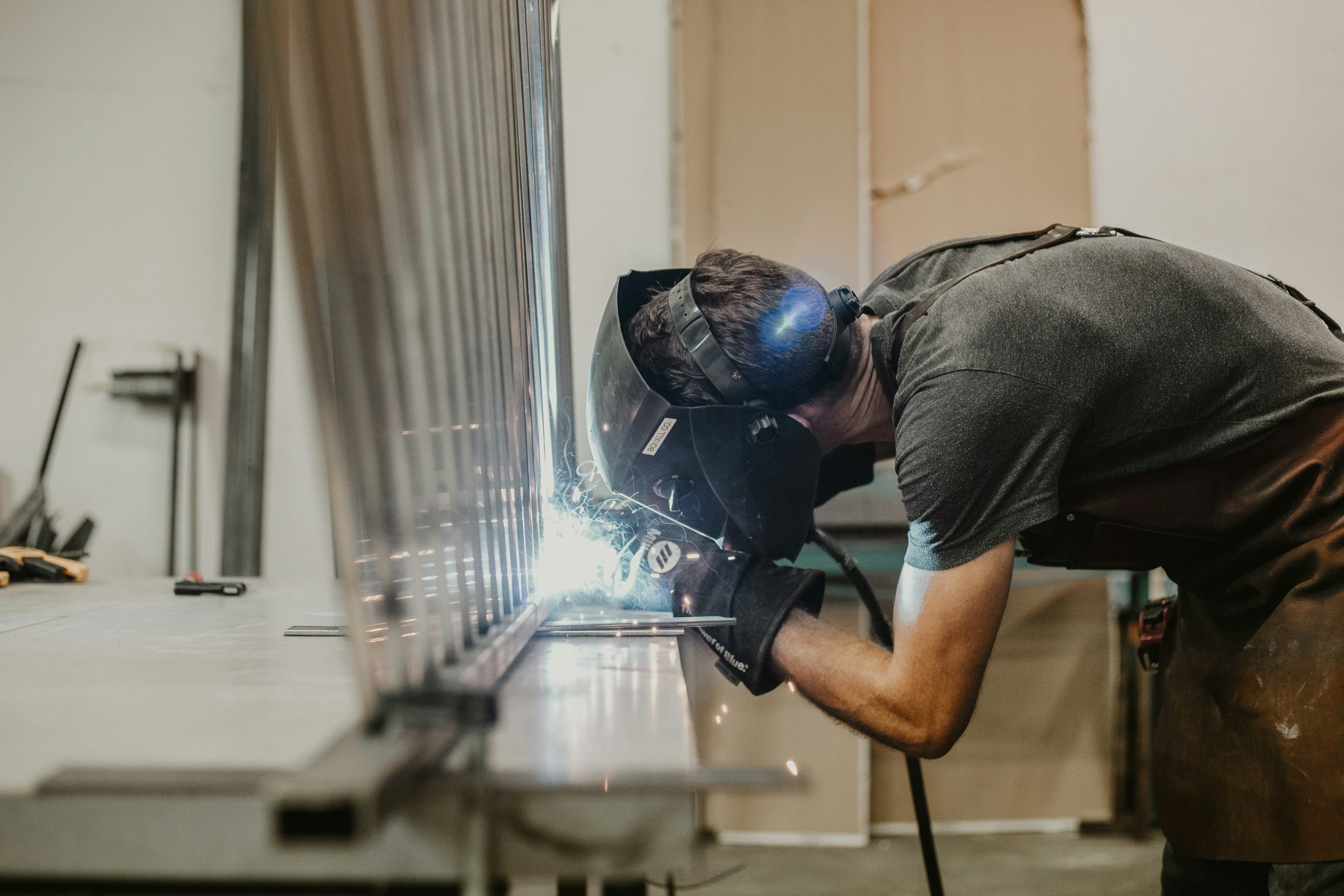 syd-mills-KAVGTm62cuw-unsplash sparks during metal laser cutting